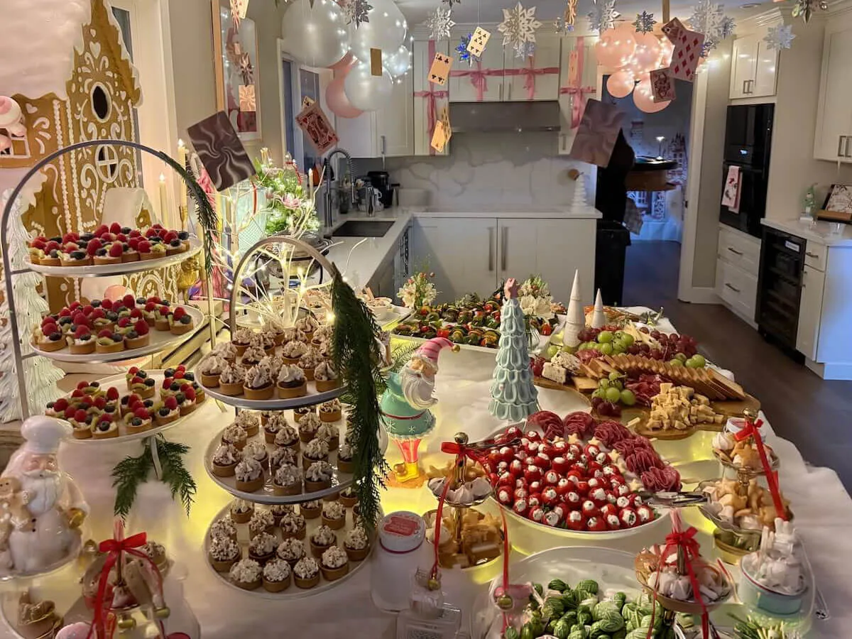 Themed appetizer and dessert tablescape with tiered tarts, cupcakes, charcuterie and pastel balloon decor — styled tablescapes for Tracy and Stockton celebrations